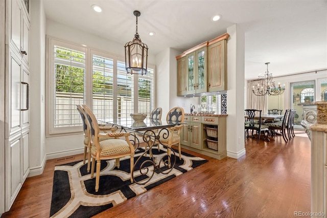 344 Saint Paul St, Denver, CO 80206 - dining space with a chandelier, recessed lighting, light wood-style floors, and baseboards