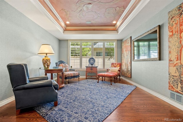 344 Saint Paul St, Denver, CO 80206 - sitting room with ornamental molding, a tray ceiling, wood finished floors, baseboards, and a textured wall