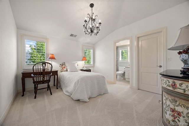 344 Saint Paul St, Denver, CO 80206 - bedroom with light carpet, a chandelier, vaulted ceiling, baseboards, and ensuite bathroom