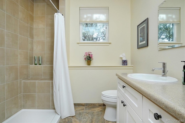 18202 Alta Vista Dr, Buena Vista, CO 81211 - bathroom with toilet, tiled shower, and vanity