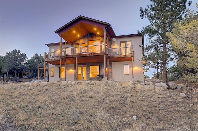18202 Alta Vista Dr, Buena Vista, CO 81211 - rear view of house with a balcony and stucco siding
