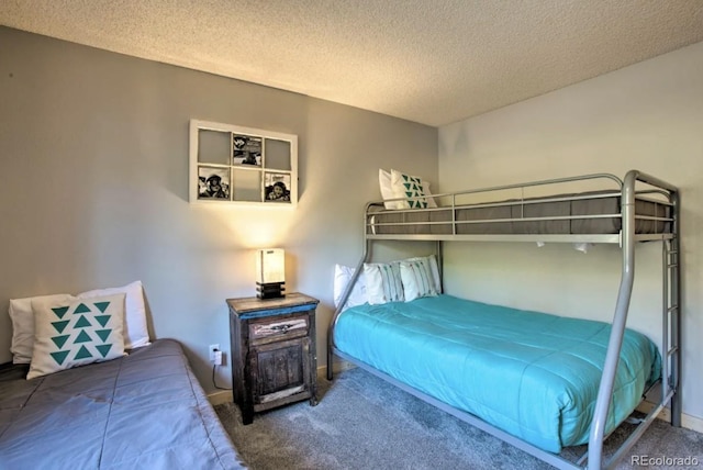170 Gcr 838 Unit 6, Fraser, CO 80442 - bedroom featuring carpet flooring and a textured ceiling