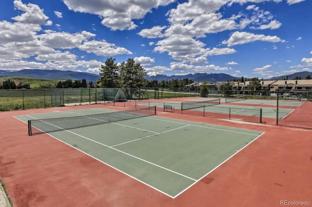 170 Gcr 838 Unit 6, Fraser, CO 80442 - view of tennis court featuring a mountain view and community basketball court