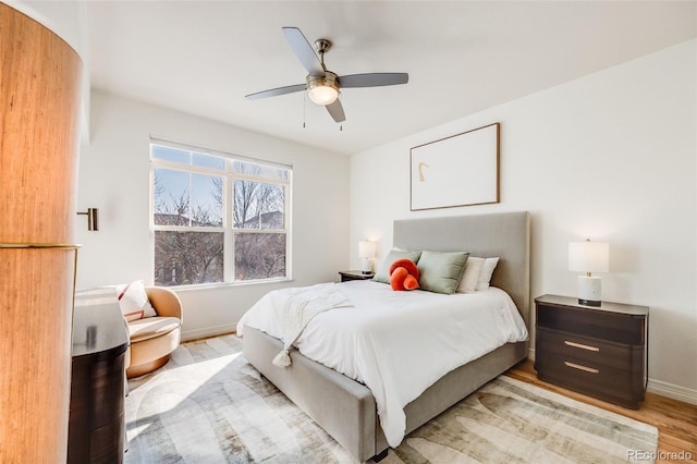 111 S Monroe St Unit B203, Denver, CO 80209 - bedroom featuring light wood-type flooring and a ceiling fan