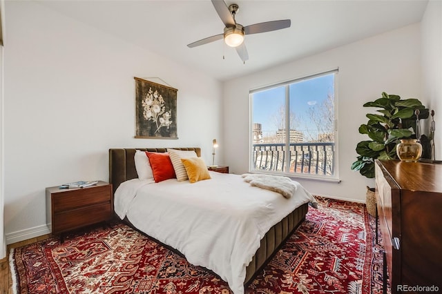 111 S Monroe St Unit B203, Denver, CO 80209 - bedroom featuring baseboards and a ceiling fan