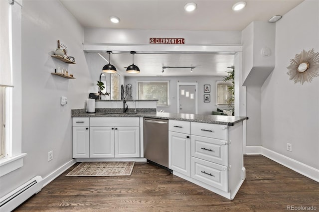 3464 S Downing St, Englewood, CO 80113 - kitchen with baseboard heating, dishwasher, a peninsula, white cabinets, and dark wood-type flooring
