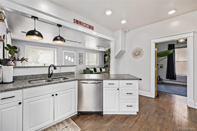 3464 S Downing St, Englewood, CO 80113 - kitchen with stainless steel dishwasher, white cabinetry, dark wood-style flooring, and recessed lighting