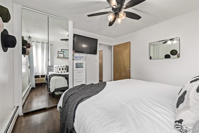 3464 S Downing St, Englewood, CO 80113 - bedroom featuring a baseboard heating unit, hardwood / wood-style floors, ceiling fan, and a textured ceiling