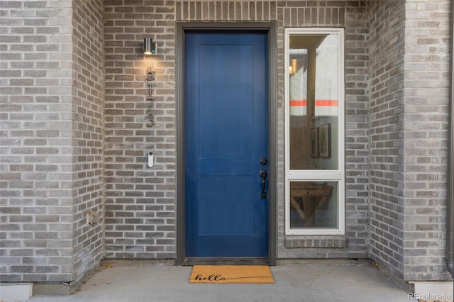 5173 Vivian St, Wheat Ridge, CO 80033 - doorway to property with brick siding