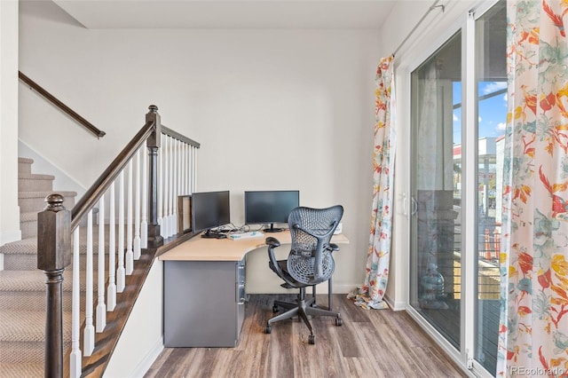 5173 Vivian St, Wheat Ridge, CO 80033 - home office featuring wood finished floors and baseboards