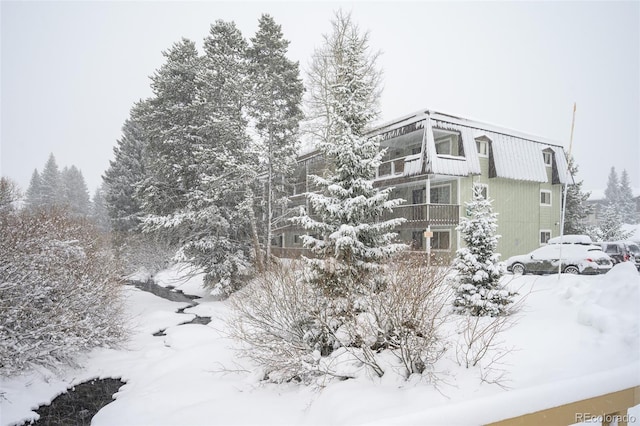 view of snow covered building