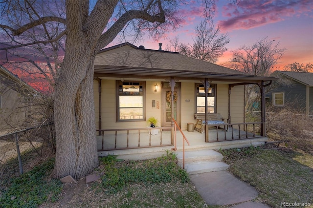 306 E Cannon St, Lafayette, CO 80026 - bungalow with covered porch and a shingled roof
