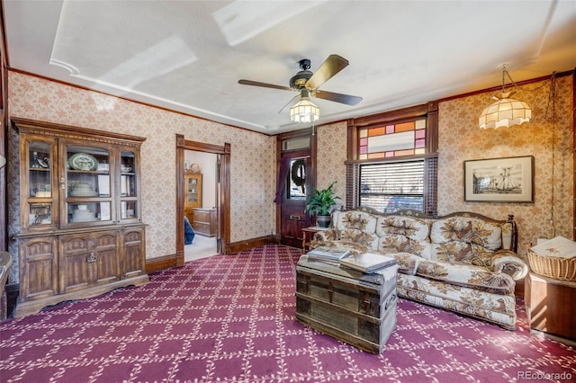 306 E Cannon St, Lafayette, CO 80026 - living room with a ceiling fan, crown molding, baseboards, wallpapered walls, and dark carpet