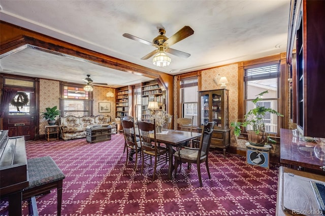 306 E Cannon St, Lafayette, CO 80026 - carpeted dining space with a ceiling fan, wallpapered walls, and plenty of natural light