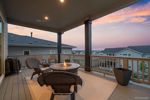 5390 Edenborn Way, Castle Rock, CO 80104 - wooden terrace with a fire pit and area for grilling