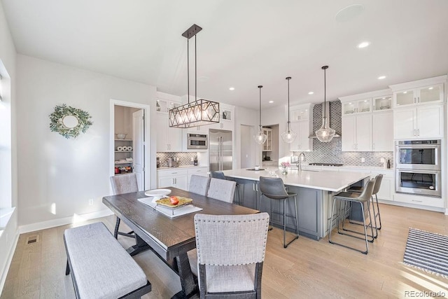 5390 Edenborn Way, Castle Rock, CO 80104 - dining area with light wood finished floors and recessed lighting