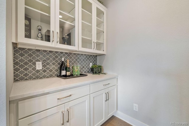 5390 Edenborn Way, Castle Rock, CO 80104 - bar featuring tasteful backsplash and baseboards