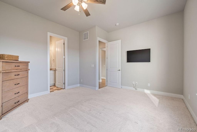 5390 Edenborn Way, Castle Rock, CO 80104 - unfurnished bedroom featuring light colored carpet, ceiling fan, and connected bathroom