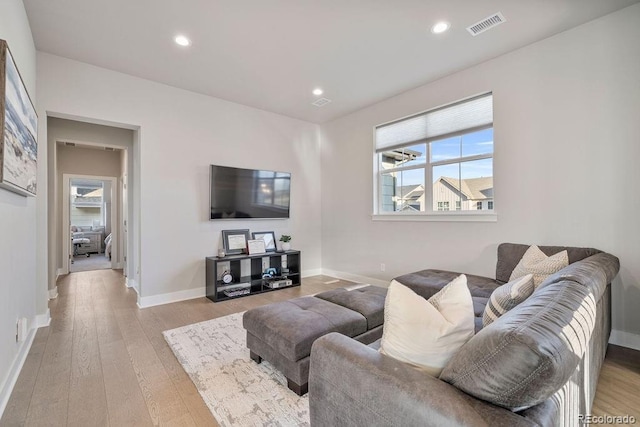 5390 Edenborn Way, Castle Rock, CO 80104 - living area featuring light wood finished floors and recessed lighting