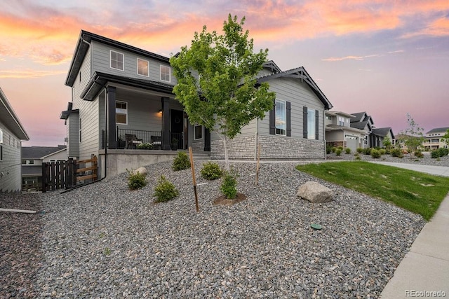 5390 Edenborn Way, Castle Rock, CO 80104 - view of front of home with a porch and stone siding