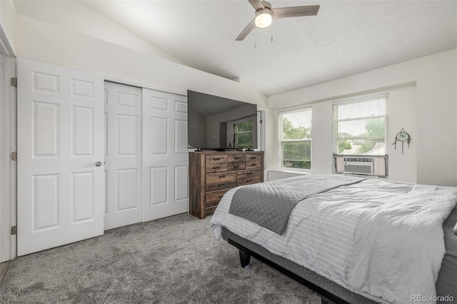 4512 Bramble Ln, Colorado Springs, CO 80925 - carpeted bedroom featuring lofted ceiling, a closet, cooling unit, a ceiling fan, and a textured ceiling