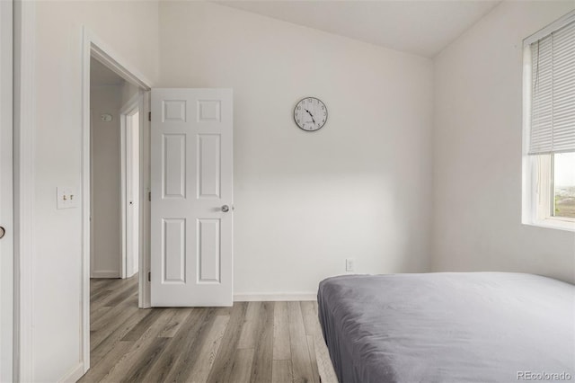 4512 Bramble Ln, Colorado Springs, CO 80925 - bedroom featuring wood finished floors and baseboards