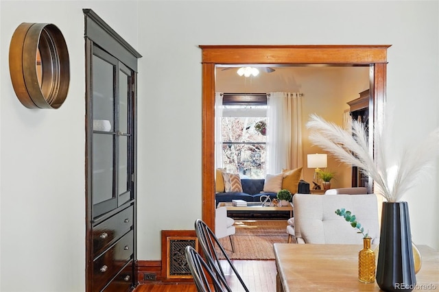 office space featuring visible vents and wood finished floors