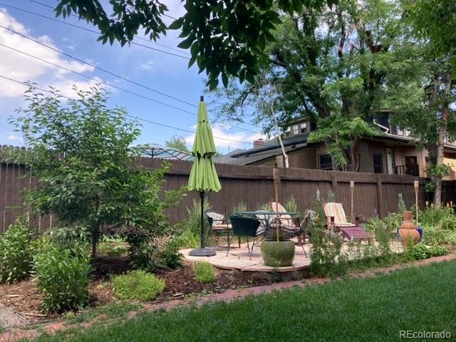 view of yard featuring a patio and a fenced backyard