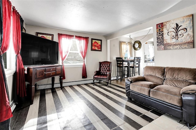 living room featuring a chandelier and hardwood / wood-style flooring