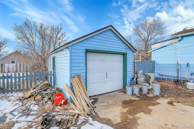 view of snow covered garage