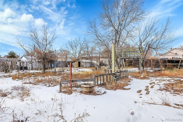 view of yard covered in snow