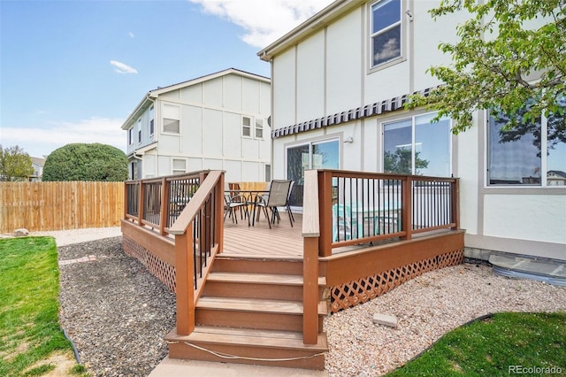 6565 W 99th Ave, Broomfield, CO 80021 - wooden terrace featuring fence and outdoor dining space