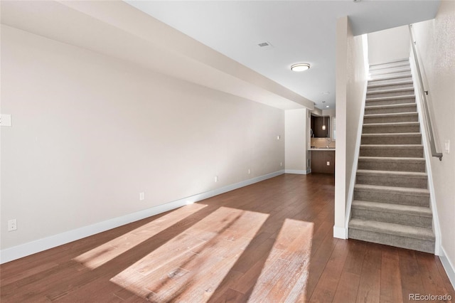 interior space with dark wood-type flooring