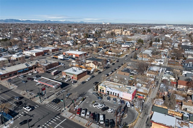 birds eye view of property featuring a mountain view