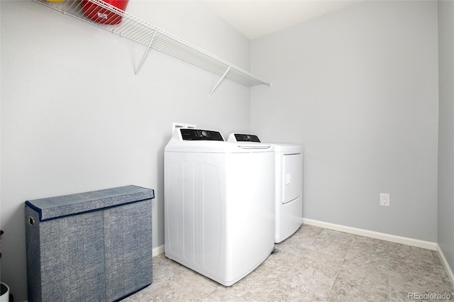 washroom featuring independent washer and dryer