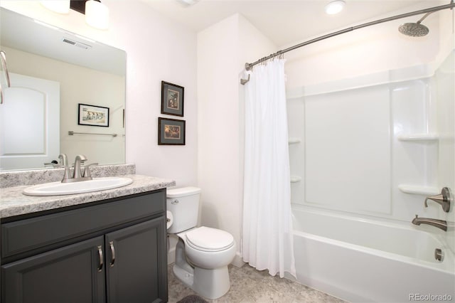 full bathroom featuring toilet, vanity, and shower / bath combo