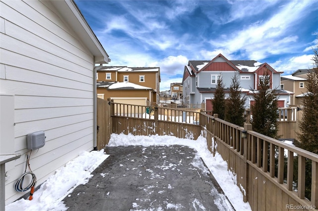 view of snow covered deck