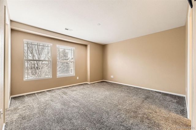 empty room featuring carpet