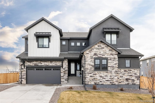 17252 Rose Mallow Ave, Parker, CO 80134 - view of front of house with an attached garage, stone siding, board and batten siding, fence, and driveway