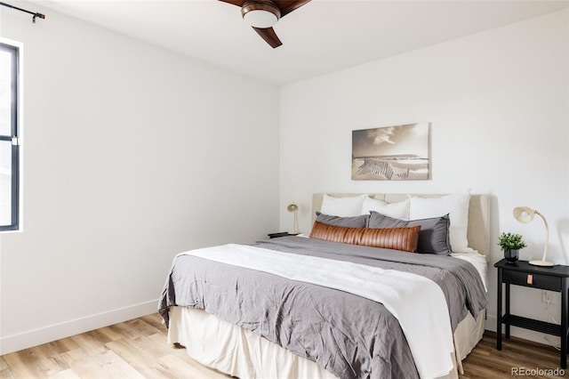 17252 Rose Mallow Ave, Parker, CO 80134 - bedroom with baseboards, a ceiling fan, and wood finished floors
