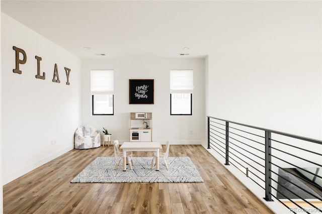 17252 Rose Mallow Ave, Parker, CO 80134 - interior space featuring a wealth of natural light, baseboards, and wood finished floors