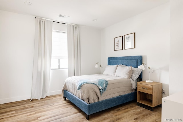 17252 Rose Mallow Ave, Parker, CO 80134 - bedroom featuring light wood-type flooring, baseboards, and visible vents
