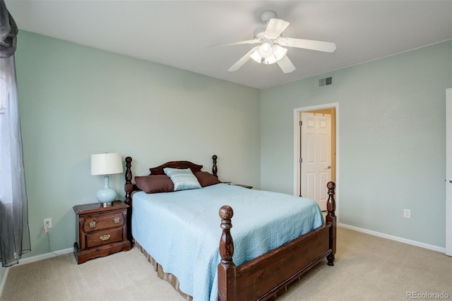 bedroom with light carpet and ceiling fan