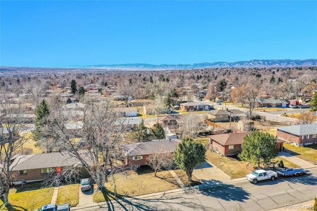 drone / aerial view with a mountain view and a residential view