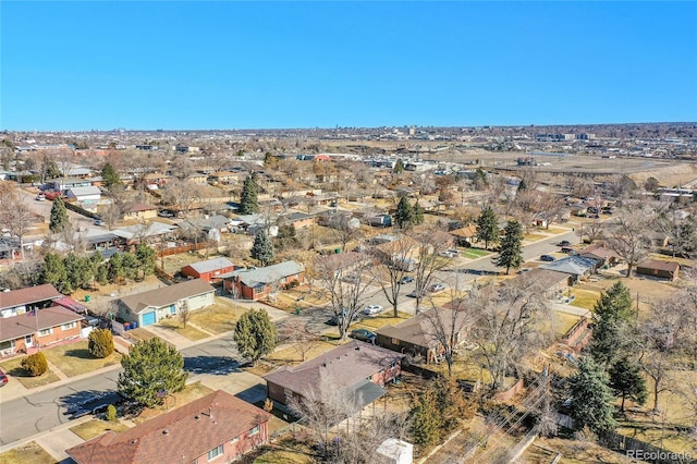 birds eye view of property with a residential view