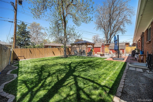 7071 Beach St, Westminster, CO 80030 - fenced backyard with a gazebo and a patio