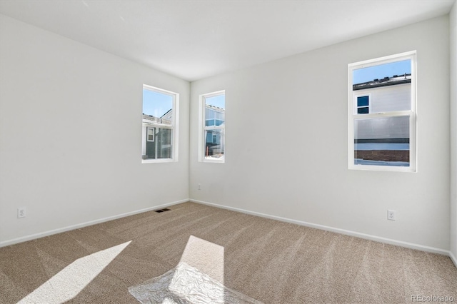 view of carpeted spare room