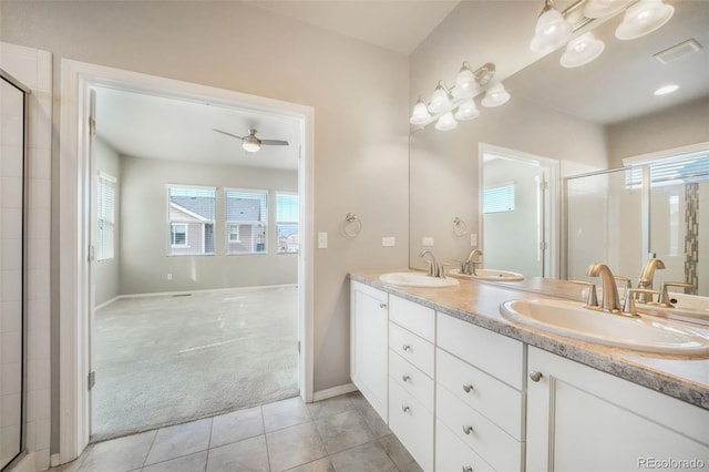 6093 Rowdy Dr, Colorado Springs, CO 80924 - bathroom with visible vents, a sink, and double vanity