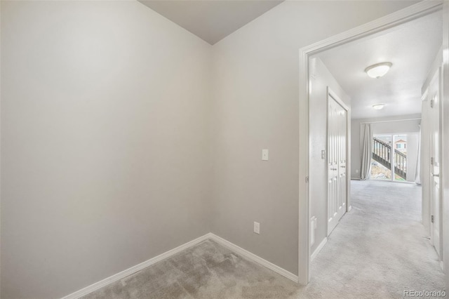 6093 Rowdy Dr, Colorado Springs, CO 80924 - hall with light carpet and baseboards