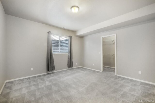 6093 Rowdy Dr, Colorado Springs, CO 80924 - spare room featuring baseboards and carpet floors